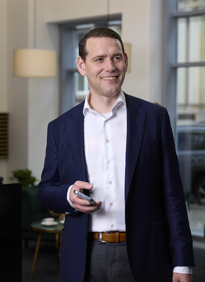 Porträt eines Mitarbeiters der INTREAL Services Fondsdienstleistungen